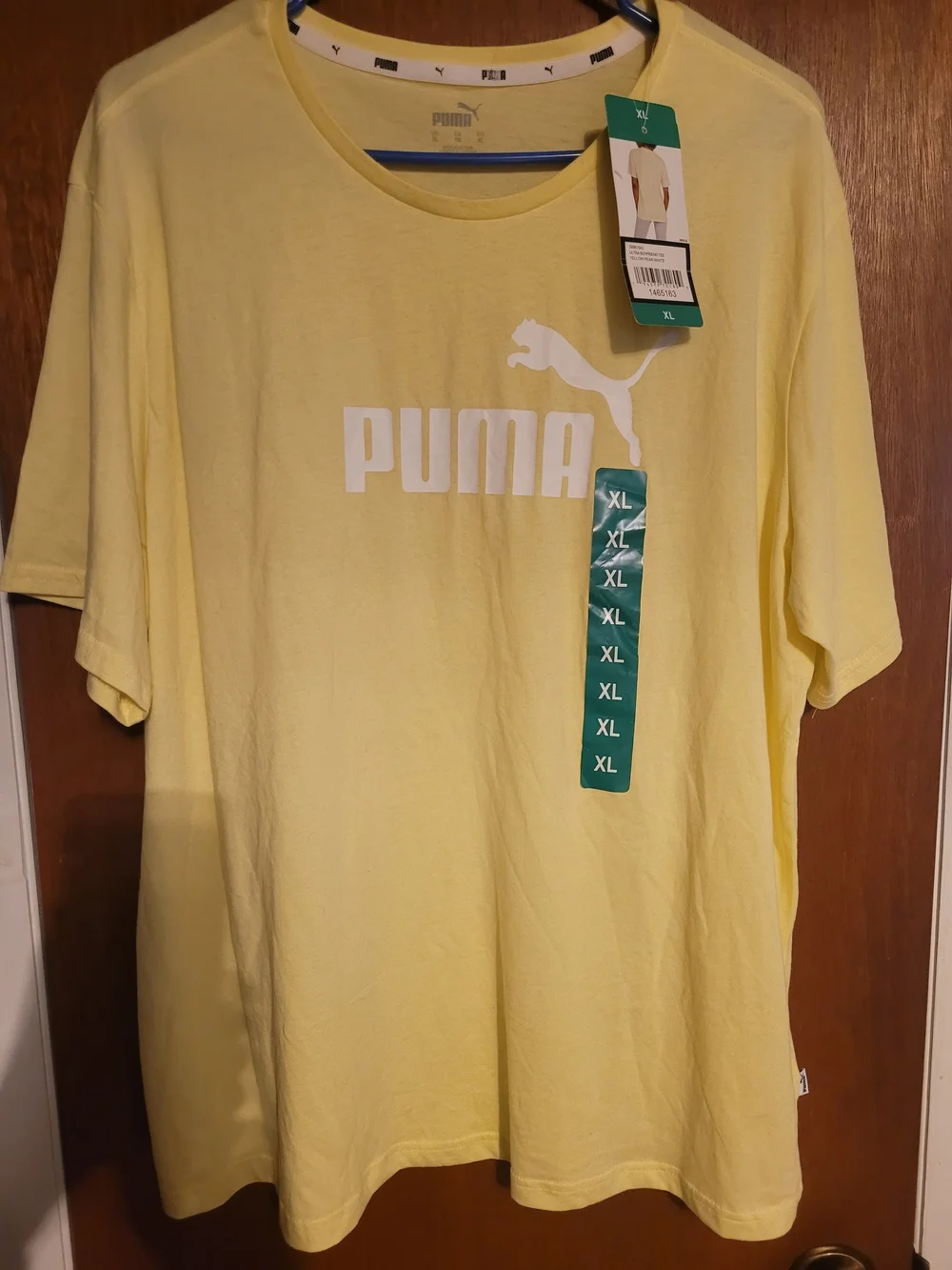 Puma Women's Light Yellow Crewneck Tee with White Logo - Picture 1 of 4